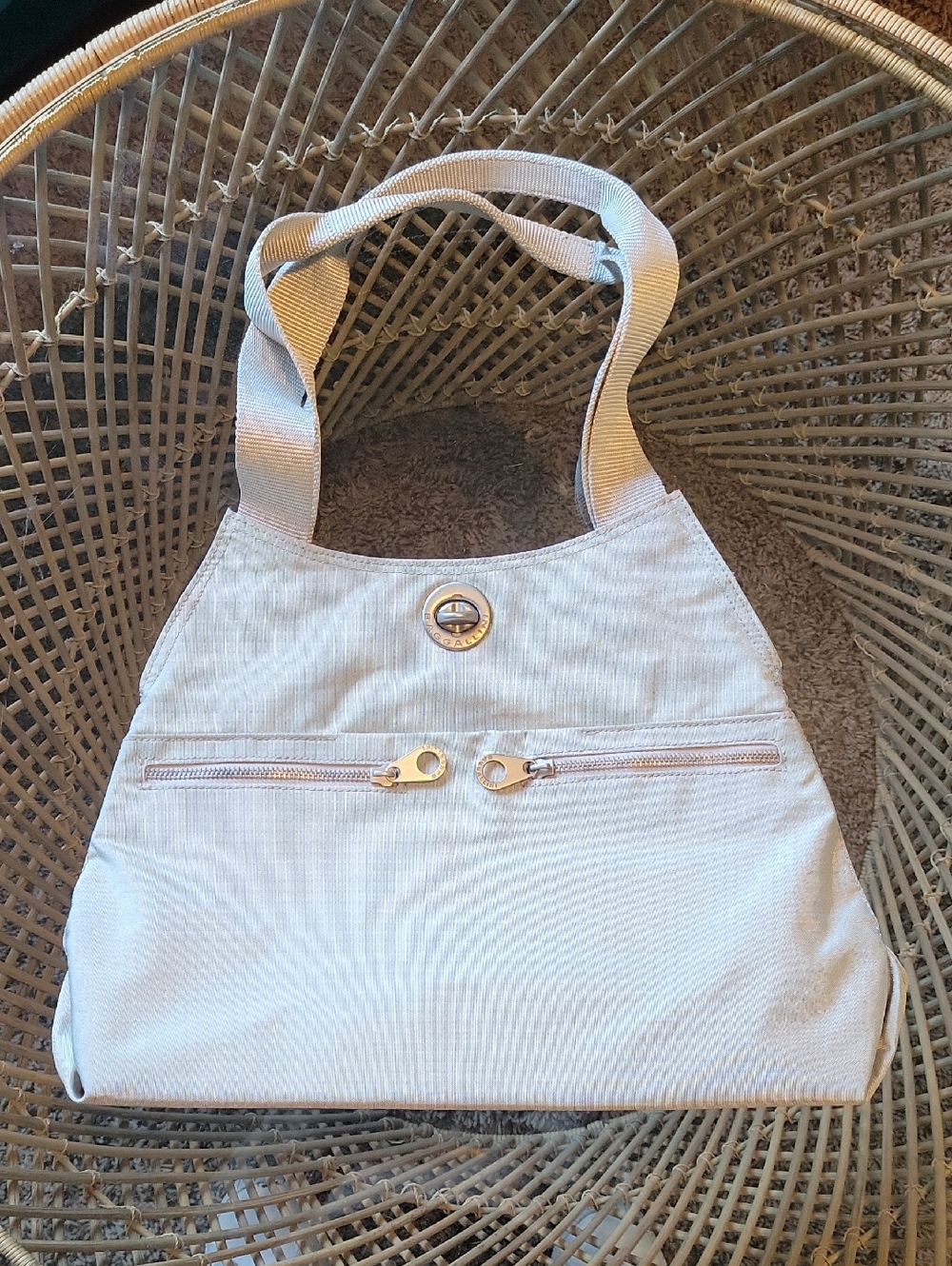 Baggalini Light Beige Shoulder Bag with Front Zip Pockets and Turn-Lock Closure